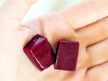 Super Beet Chewables in hand